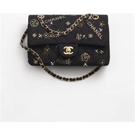 chanel gold handbag|More.